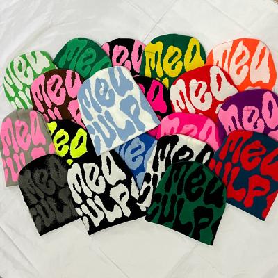 China COMMON 35 colors design letter jacquard new knitted custom unisex slouchy beanies warm moq stocking beanies OEM Logo Winter hat for sale