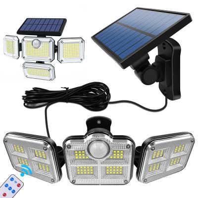 China Garden Solar Lights Outdoor LED Wall Lamp with Adjustable Heads Security LED Flood Light IP65 Waterproof with 3 Working Modes for sale