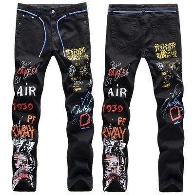 China Fashion Streetwear Mens Jeans QUICK DRY Graffiti Printed Elastic Punk Pencil Jean Pants Slim Fit Style Hip Hop Pants Mens Designer Jeans for sale