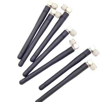 China GSM/CDMA 2100Mhz Plastic Flexible External Antenna Rod Communication Rubber Antenna With 90 Degree SMA Connector for sale