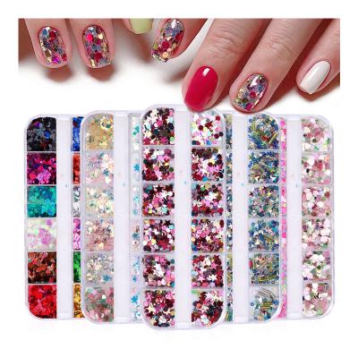 China Decorate Nail Ready To Ship DIY Glitter Snowflake Glitter Nail Grid Designer 12 Loose Heart Nails Charm for sale