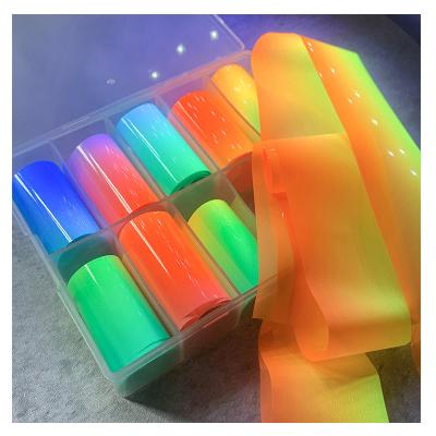 China Eco-friendly Ready To Ship Fluorescent Water Transfer Nail Foil Stickers Set Holographic Silver Book for sale