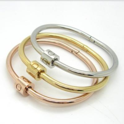 China Factory Wholesale FASHIONABLE OEM Stainless Steel Colors Lady Size Twist Lock Bracelet Bangle Surgical Plating Jewelry Set for sale