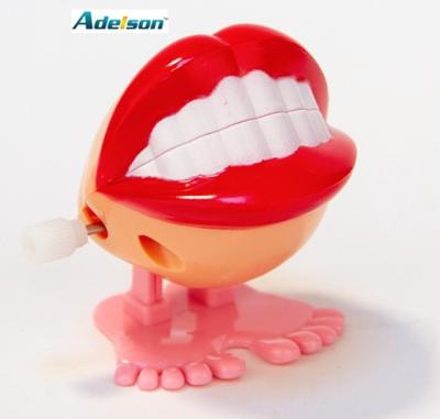 China happy & Cute Cartoon Dental Jumping Tooth Toy Dental Toy Plastic Jumping Dental Gift For Kids for sale