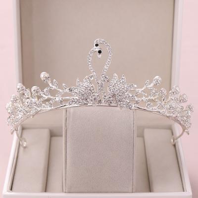 China Hair Decoration Fashionable Elegant Bridal Wedding Swan Shaped Crown Tiara Dress Gown Rhinestone Crystal Custom Crowns for sale