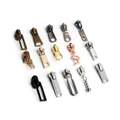 China Metal Slider Nickel Free Handbag Plating Gold Nickel Custom Slider Zipper Puller for sale