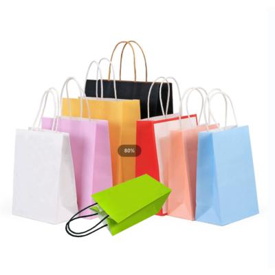 China Custom Hot Sale Luxury Gift Packaging Materials Kraft Paper Bag Store Recycled Paper Shopping Bags With Your Own Logo for sale