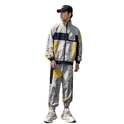 China 2021 Stylish Unisex Sweatsuit Breathable Zippered Hoody Anorak Sweatsuit 2 Piece Contrast Color Sportswear for sale