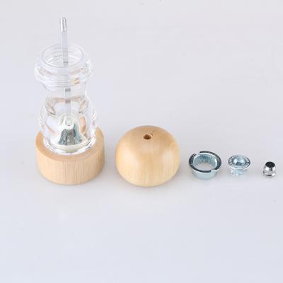 China Durable Kitchen Supplies Seasoning Rubber Wooden Bottle Grinder Peppercorn Grinder Manual Pepper Grinder Acrylic Outdoor Pepper Mill for sale