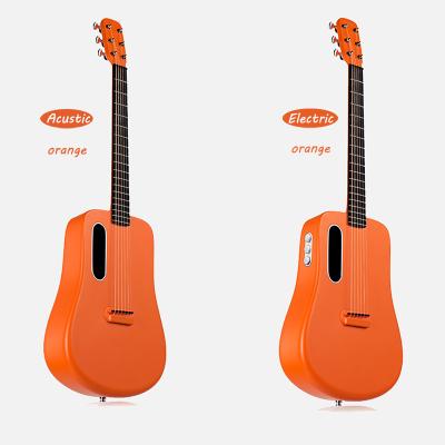 China 2021 new arrival carbon fiber guitar and 36 inch carbon fiber body with electric box electric acoustic guitar for sale