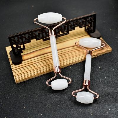 China Skin Tightening Face Massage White Amethyst Jade Roller Gua Sha Rose Crystal Quartz Guasha Massage Stone Set for sale