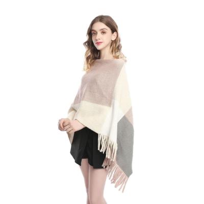 China Custom Wholesale Tassels Anti Shrink Bat Acrylic Sleeve Pocket Turtle Neck Knitted Ladies Womens Poncho Sweaters for sale