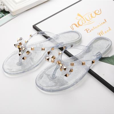 China Wholesale 2022 Fashion Trend Jelly Beach Ladies Plastic Slippers Summer And Sandals Flip Flops Outdoor PVC Rivets Women's Slippers for sale