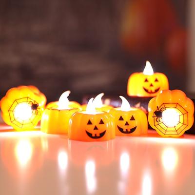 China 12 PCS/BOX Wholesale Halloween Candle Easter Pumpkin Night Light Decoration Glowing Candle LED Tealight Party Supply Party Supply for sale