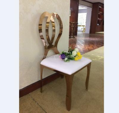 China Hotel Chair Gold Plated Stainless Steel Infinity Wedding Chair With Angel Wing for sale