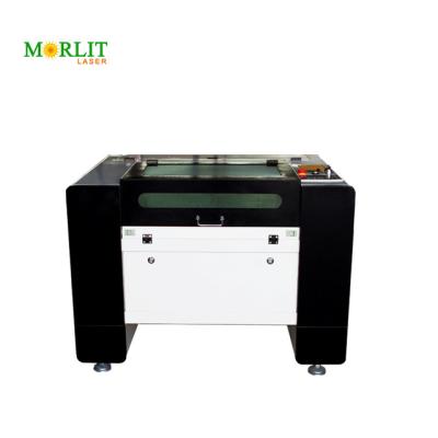 China 4060 50w 80w 100w water cooled CO2 laser engraving machine cutting metal, plastic, acrylic, fabric, suitable for clothing and crafts. for sale