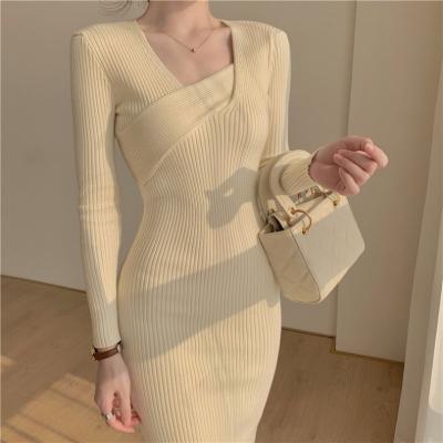 China Anti-wrinkle Knit Long Sleeve Sweater Dress V-Neckline Slim Black Long Hip Skirt 2022 New Split Design for sale