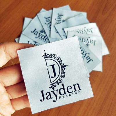 China Sustainable High Quality Iron On Clothes Labels Cheap Trademark Label Customized Label None-woven For Clothing for sale