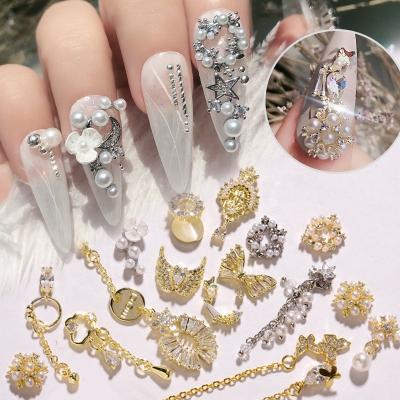 China Easy Apply Newest 3D Stars Moon Zircon Nail Decoration Metal Chain Butterfly Nail Pendant Ornament for sale