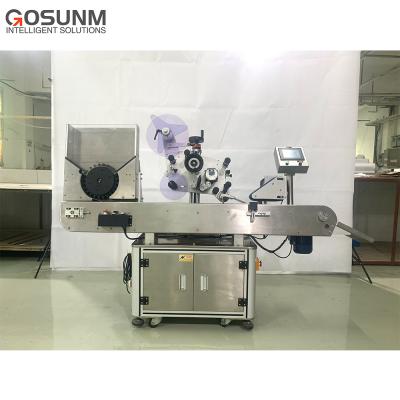 China GOSUNM Beverage Horizontal Type Full Auto Labeling Machine With Round Bottle Labeling Machines for sale