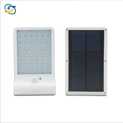 China Stylish New Design Outdoor Solar Led Motion Sensor Wall Light for sale