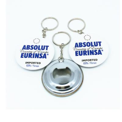 China Portable cheap custom logo printing round metal tin bottle opener keychains for sale