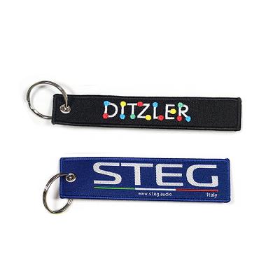 China Custom Cheap Apparel Jet Tag Fabric Embroidery Car Keychains Woven Key Chain For Promotional Gifts for sale