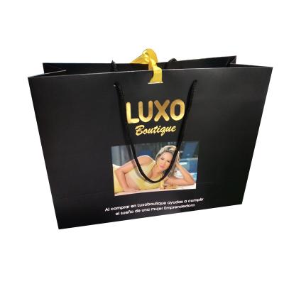 China Wholesale Cheap Price Luxury Famous Brand Gift Custom Recyclable Printed Shopping Paper Bag for sale