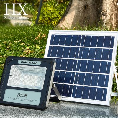 China High Brightness IP65 Reflector 85W Residential Outdoor Waterproof Solar Garden Lights Industrial Led Solar Flood Light for sale