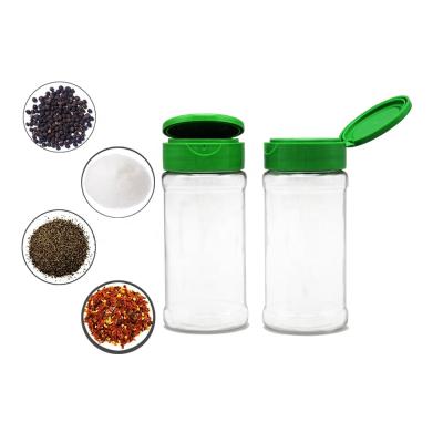 China Cooking Spice 100ml Cylinder PET Herb Spice Bottles And Shaker Plastic Jars With Flip Top Cap For Packaging 50 Grams Black Pepper Powder for sale