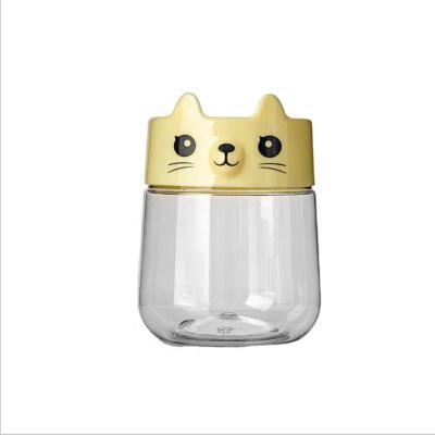 China Lovely Cartoon Food 450ml PET Shape Clear And Coin Saver Kid Candy Packaging Food Grade Plastic Jar Bottle With Coin Hole Screw Top of change for sale