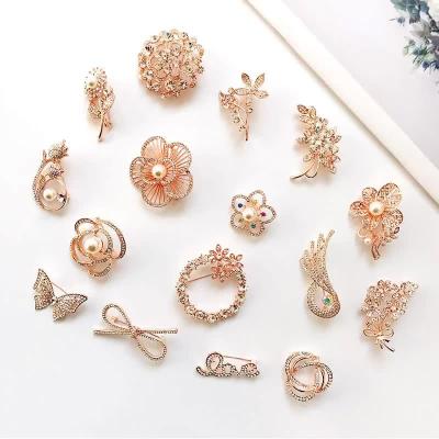 China Popular Fashion Style Camellia Pin Brooch Pearl Bow Zircon Flower Clothing Pin Brooch Rhinestone Scarf For Women Girls for sale