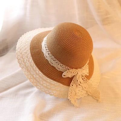 China Character Summer Pearl Bowknot Sun Beach Hat Women Lace Up Wide Brim Panama Straw Hat Floppy Sun Visor Hat for sale