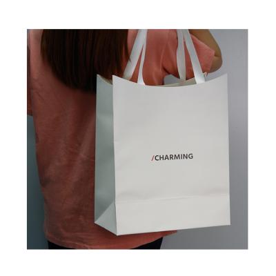 China Materials China Manufacturer Wholesale Custom Shopping Recycled Paper Bag With Handle for sale