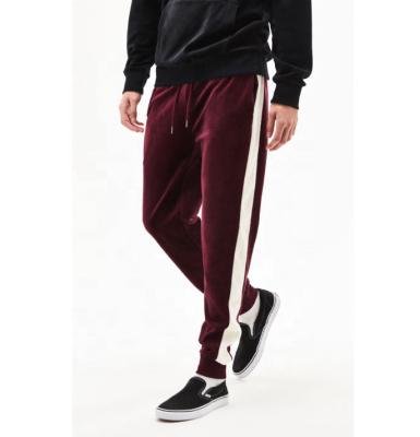 China QUICK DRY Mens Sports Tracksuit High Waist Velor Striped Track Bottom Narrow Pants With Stripe On Side Color Block Velor Sweatpants for sale