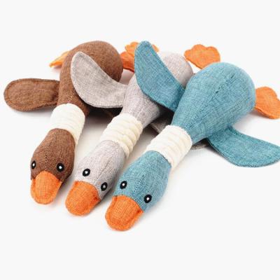 China Educational Plush Dog Toys Goose Healthy Molar Training Educational Pet Squeaky Toy for sale