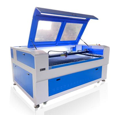 China 1390 6090 CO2 Laser Cutting Machine With RuiDa Control System for sale