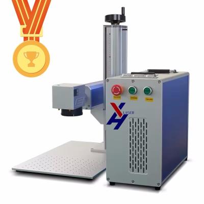 China Fiber UV CO2 Mopa Laser Marking Printing Marker Deep Jewelry Engraving Machine for metal and non-metal factory price for sale