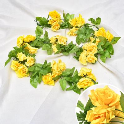 China Events Decoration Amazon New Design Artificial Green Leaves Yellow Flower Garland Decor For Porch for sale