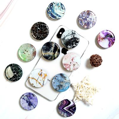 China Adjustable Wholesale Marble Epoxy Phone Airbag Grip Up Holder Sockets Holder With Glue Aluminum For Phone for sale