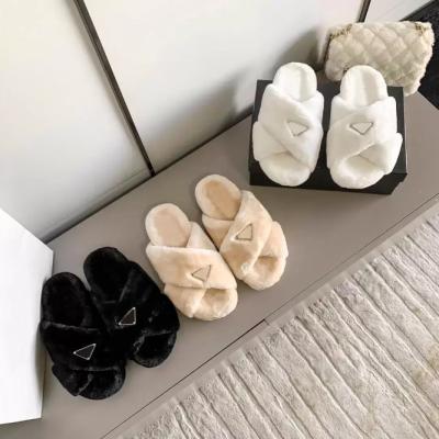 China Fashion trend ladies slippers 2022 designer fluffy home famous brand designer fur shoes luxury fur slippers for women for sale