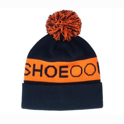 China COMMON Wholesale Fashion Winter Hat Unisex Toque Knit Jacquard Pom Pom Beanie Hat Custom Made for sale