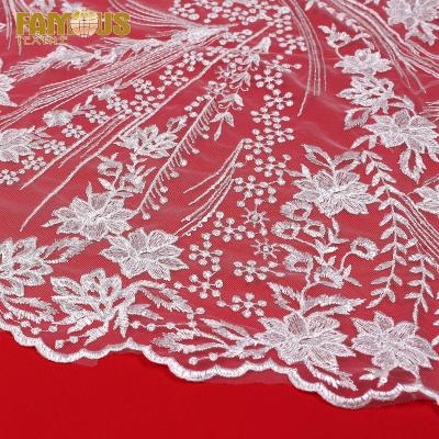 China Other design high quality white lace fabric Swiss voile lace fabric embroidery with order for bridal dresses for sale