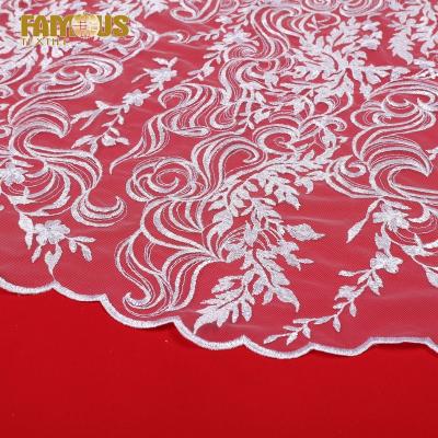 China Other White Flower Pattern Embroidery French Tulle Lace Fabric Making Machine With Clear Sequins For Bridal Wear for sale