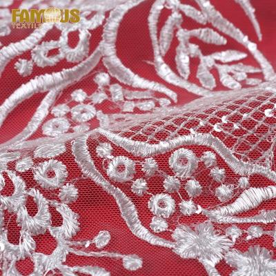 China Other Fashionable Design Leaves Pattern White Lace Beads Embroidery Fabrics With Sequins For Women for sale