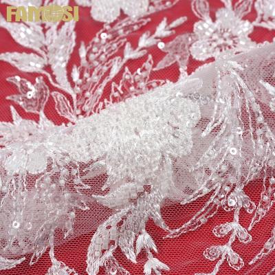 China Other 2022 Swiss heavy beaded shiny embroidery sequins bridal white guipure lace fabric for lady for sale