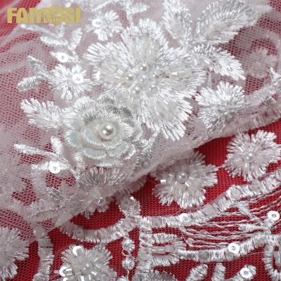 China Other high quality white heavy beaded 3d tulle sequin embroidery lace fabric for bridal fabric making for sale