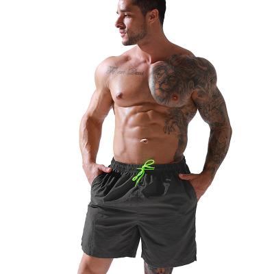 China Viable Wholesale Custom Men's Waterproof Outdoor Quick Dry Beach Shorts Summer Solid Color Casual Loose Shorts for sale