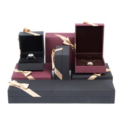 China New Mold Paper Plastic Bow Tie Plastic Leatherette Decoration Special Jewelry Set Box for sale