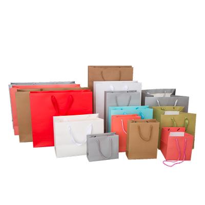 China 2020 custom size color 230gram recyclable wholesale paper shopping bag with rope handle for sale